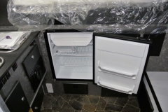 Fridge-located-along-front-wall-of-camper