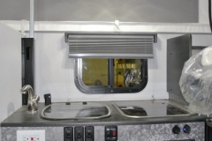 Wild-Kitchen-with-Optional-Overhead-Cabinet-Glass-Stove-Glass-Sink